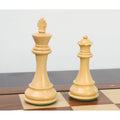 Premium boxwood Alban Knight Staunton chess pieces king and queen standing on a board.