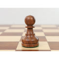 Standard Staunton style golden rosewood tournament pawn chess piece with green felt base.