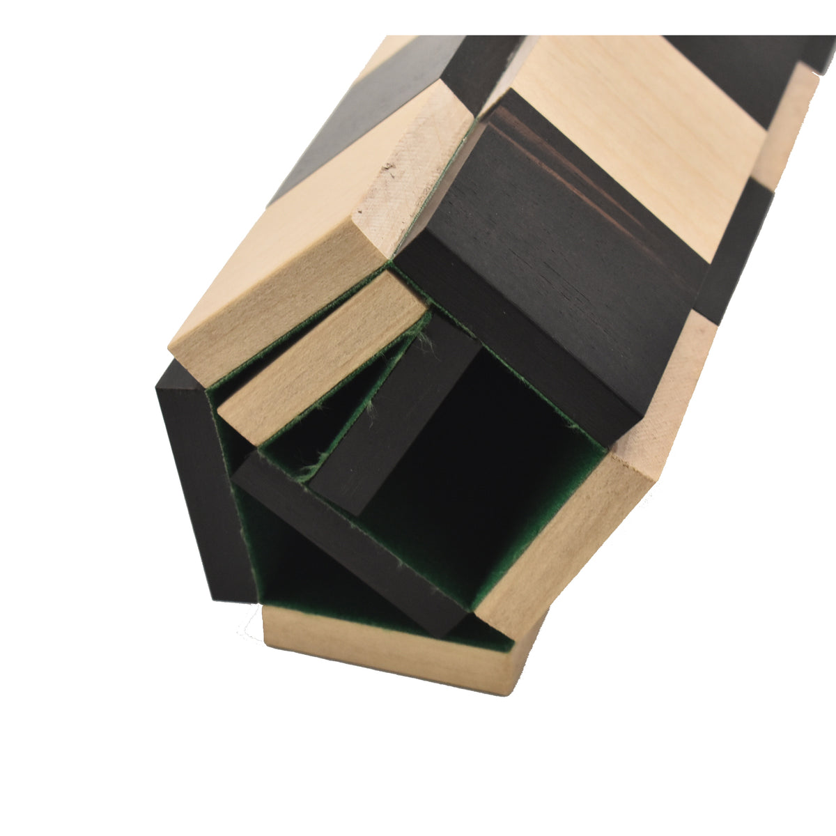 Close-up of the rolled travel chess board showing its hollow core and protective felt lining.