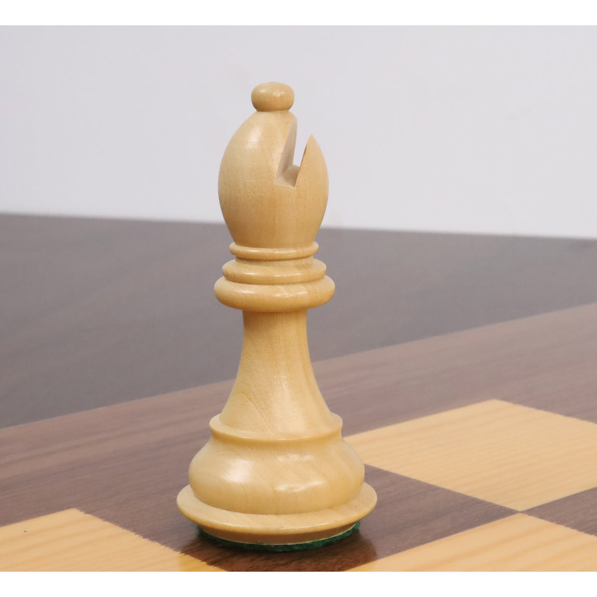 Elegant boxwood bishop chess piece from the Bridle Staunton luxury series.