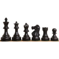 Close-up of a single ebonised boxwood pawn from the Reykjavik Series Staunton chess set on a board.