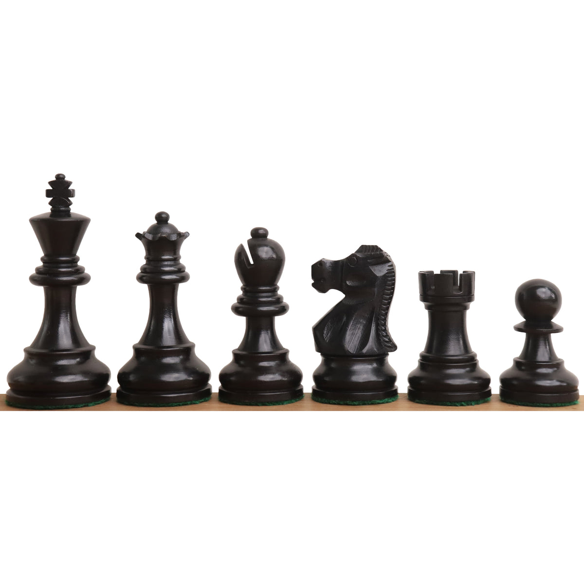 Close-up of a single ebonised boxwood pawn from the Reykjavik Series Staunton chess set on a board.