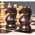 Two hand-carved rosewood knight chess pieces from the Majestic Series Staunton collection.