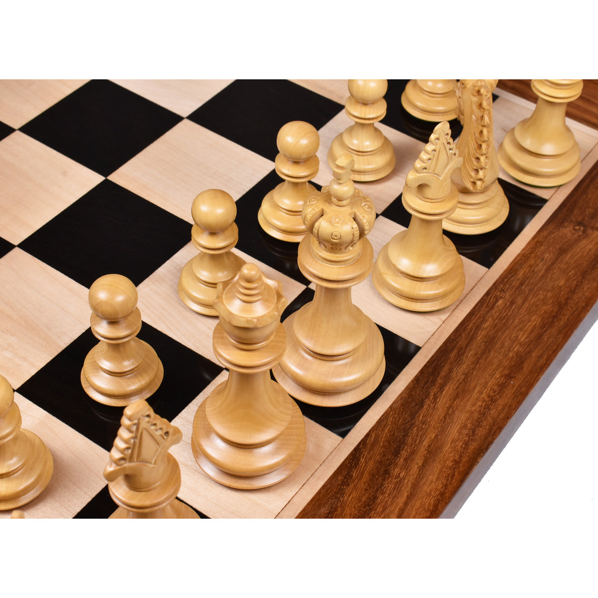 Ornate 4.5 inch boxwood chess pieces positioned on a luxury checkered board.