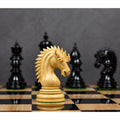 Hand-carved boxwood knight from the Dragon Luxury Staunton chess set standing on a gloss finished chessboard.