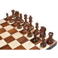 Dark Golden Rosewood chess pieces from the double-weighted 1970s Dubrovnik set arranged on a wooden chessboard.