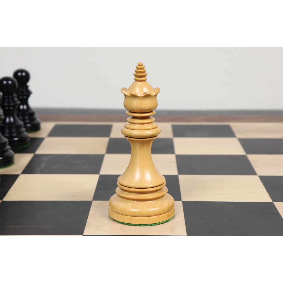 Elegant light boxwood queen piece from the Stallion Staunton luxury chess set.