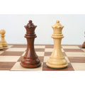 Golden Rosewood and natural boxwood Pro Staunton Queen pieces displayed side-by-side.