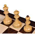 A wide perspective shot of the Rosewood and Boxwood Dubrovnik chess set on a matching wooden board.
