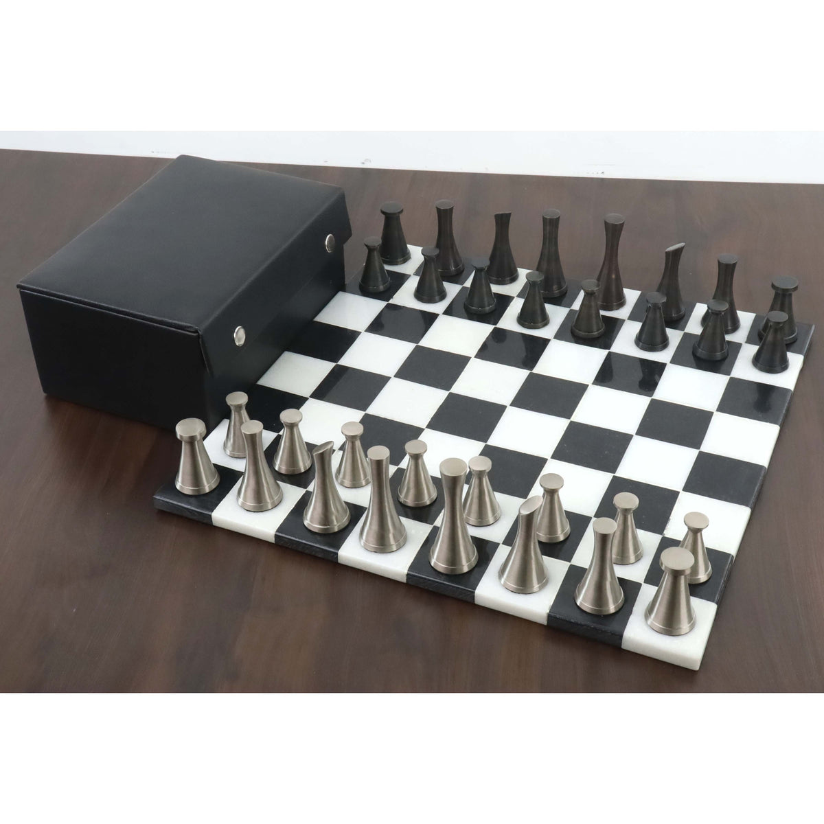 3.1" Tower Series brass metal chess set, marble board, and storage box in a full set configuration.