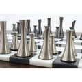 Close-up of 3.1" Tower Series brass chess pieces showcasing the modern metal design and finish.