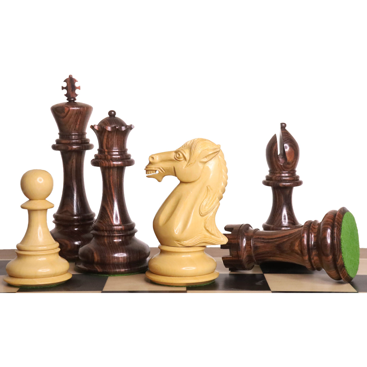 Artistic display of 6.1-inch Mammoth Staunton rosewood and boxwood pieces.