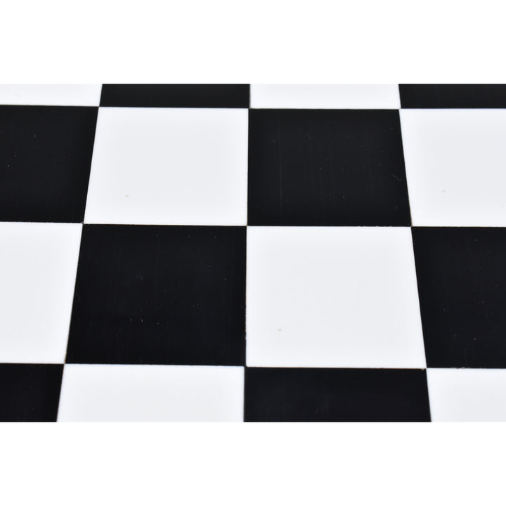 Close-up of the smooth acrylic ivory and black squares on a premium library series wooden chess board.