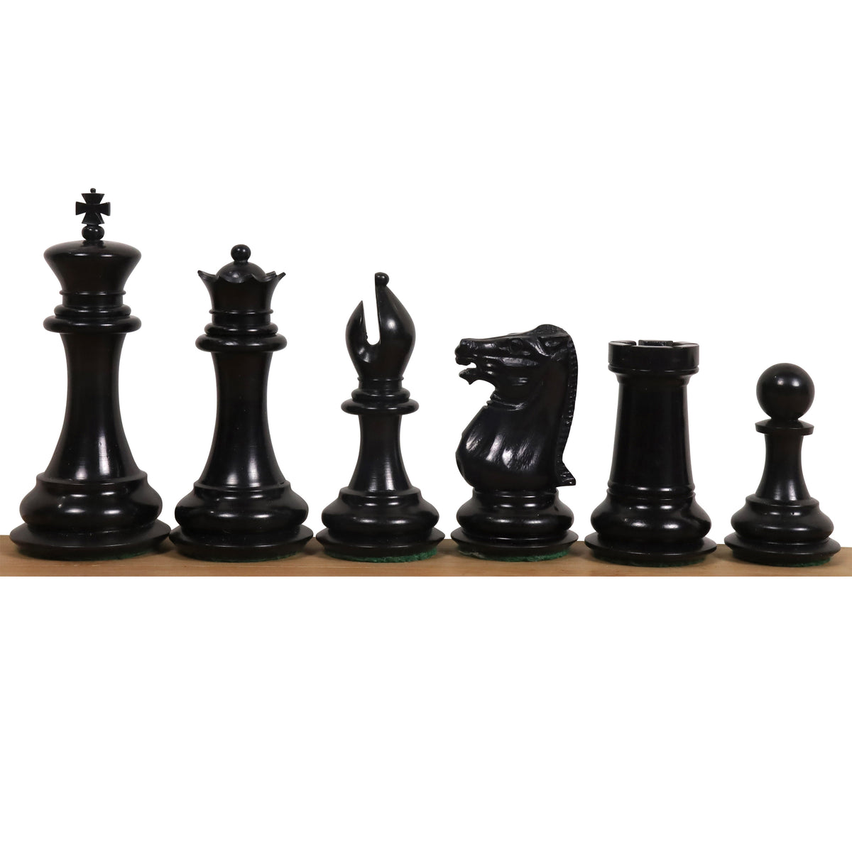 Lineup of black stained camel bone chess pieces featuring the King, Queen, Bishop, Knight, Rook and Pawn.