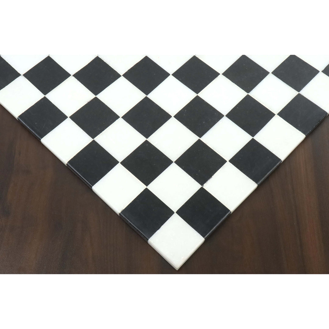 Close-up of the seamless borderless edge on a black and white marble stone chess board.