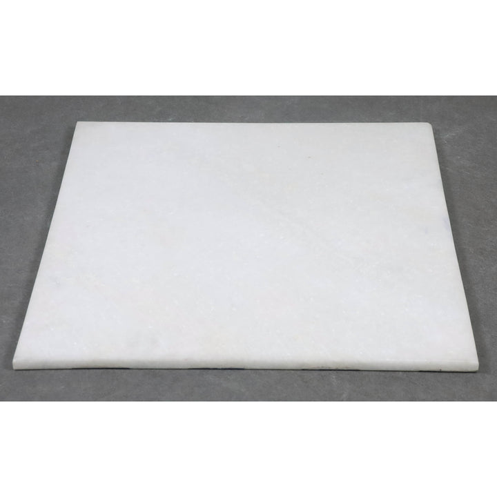 Solid white marble underside of a handcrafted luxury stone chess board.