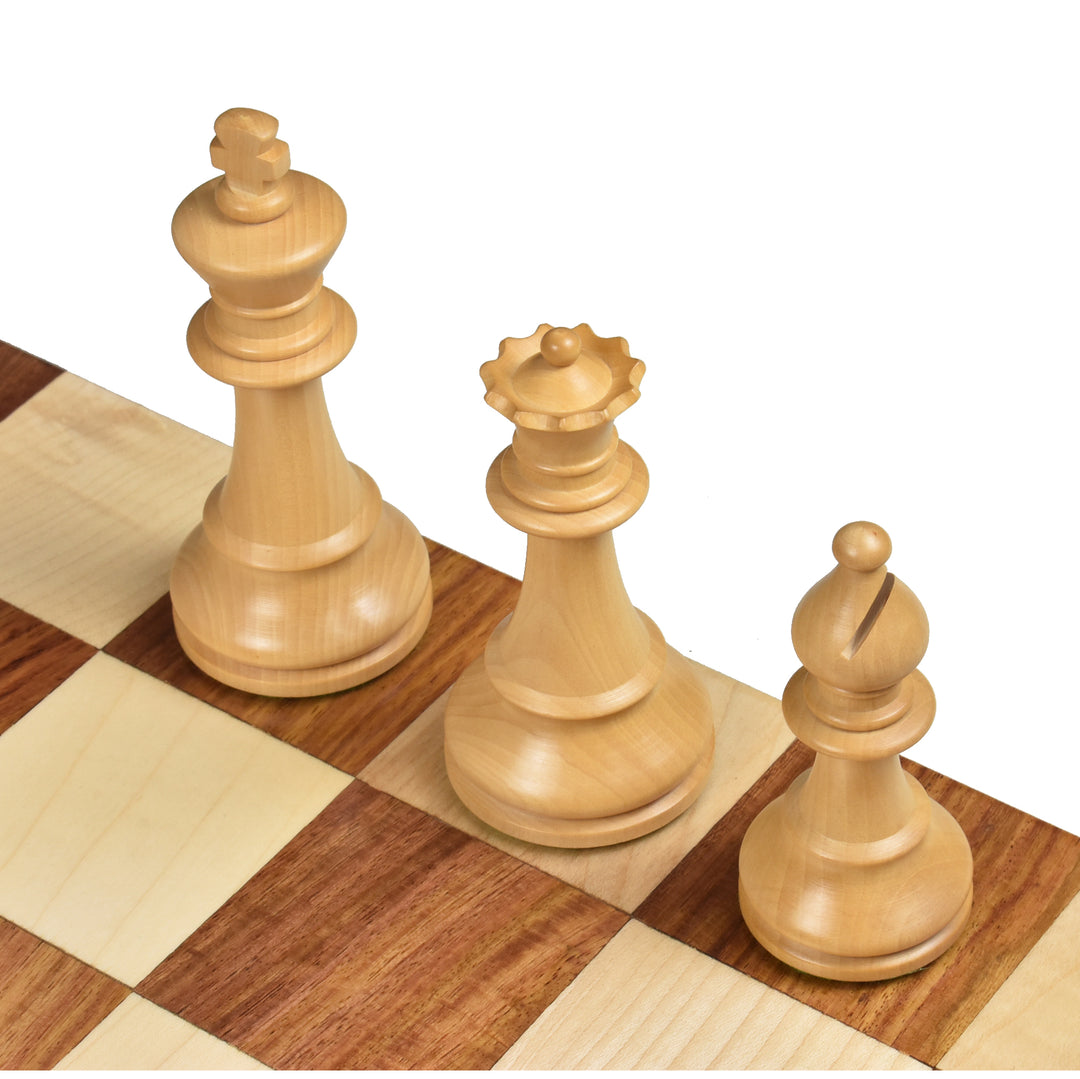 Top-down view of 1920s German style King, Queen, and Bishop pieces in polished Boxwood.