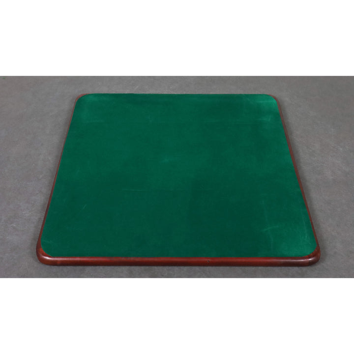 Underside of the chess board covered in protective green felt to prevent scratches on surfaces.