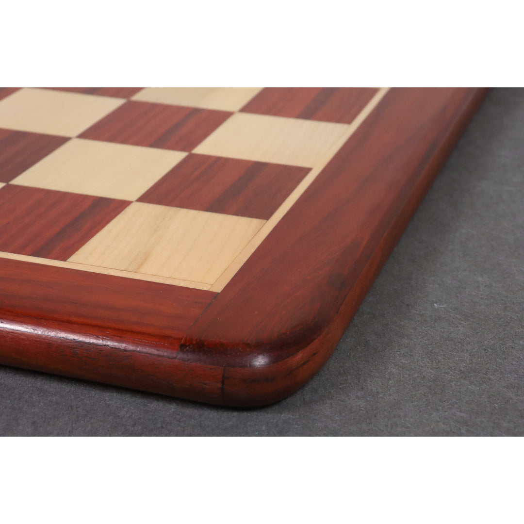 Close-up highlighting the natural wood texture of the bud rosewood border on a chess board.