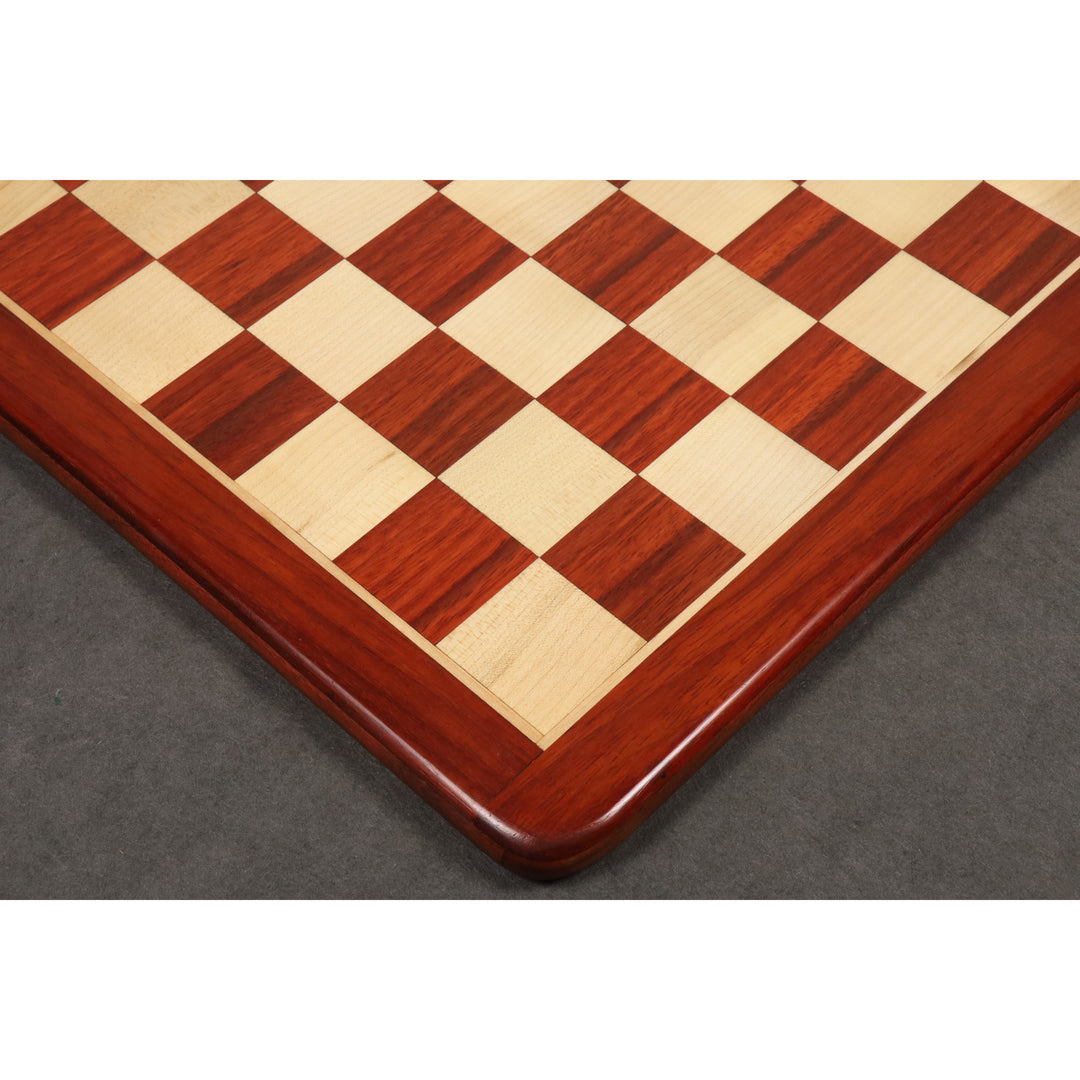 Precision wood inlay detail of a 19 inch bud rosewood and maple chess board with 50 mm squares.