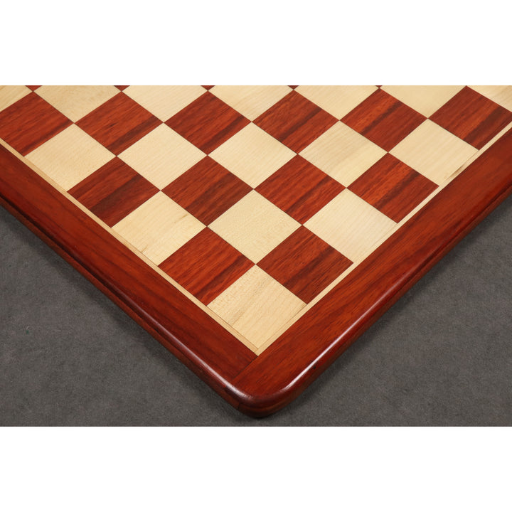 Precision wood inlay detail of a 19 inch bud rosewood and maple chess board with 50 mm squares.