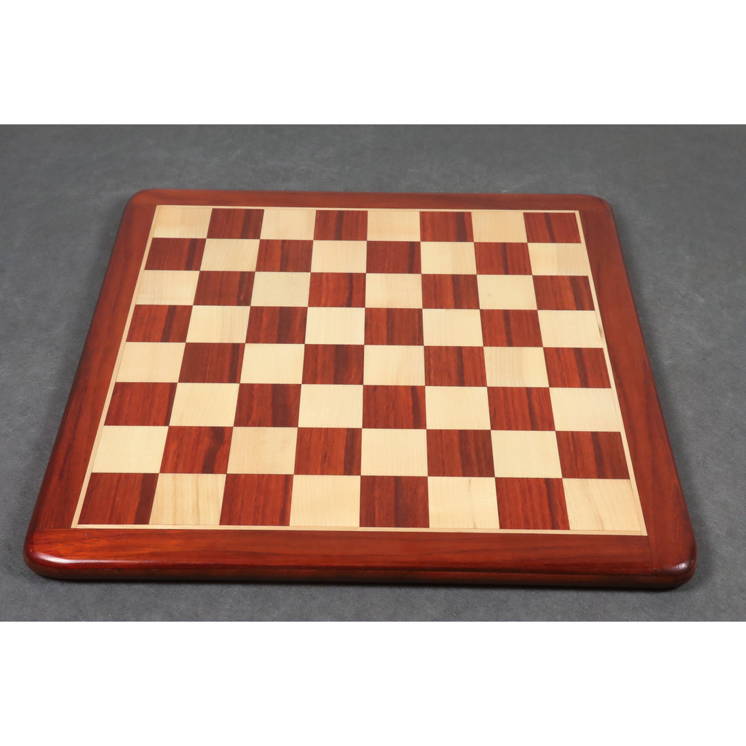 Complete 19 inch bud rosewood and maple wood chess board with a polished finish and rounded edges.