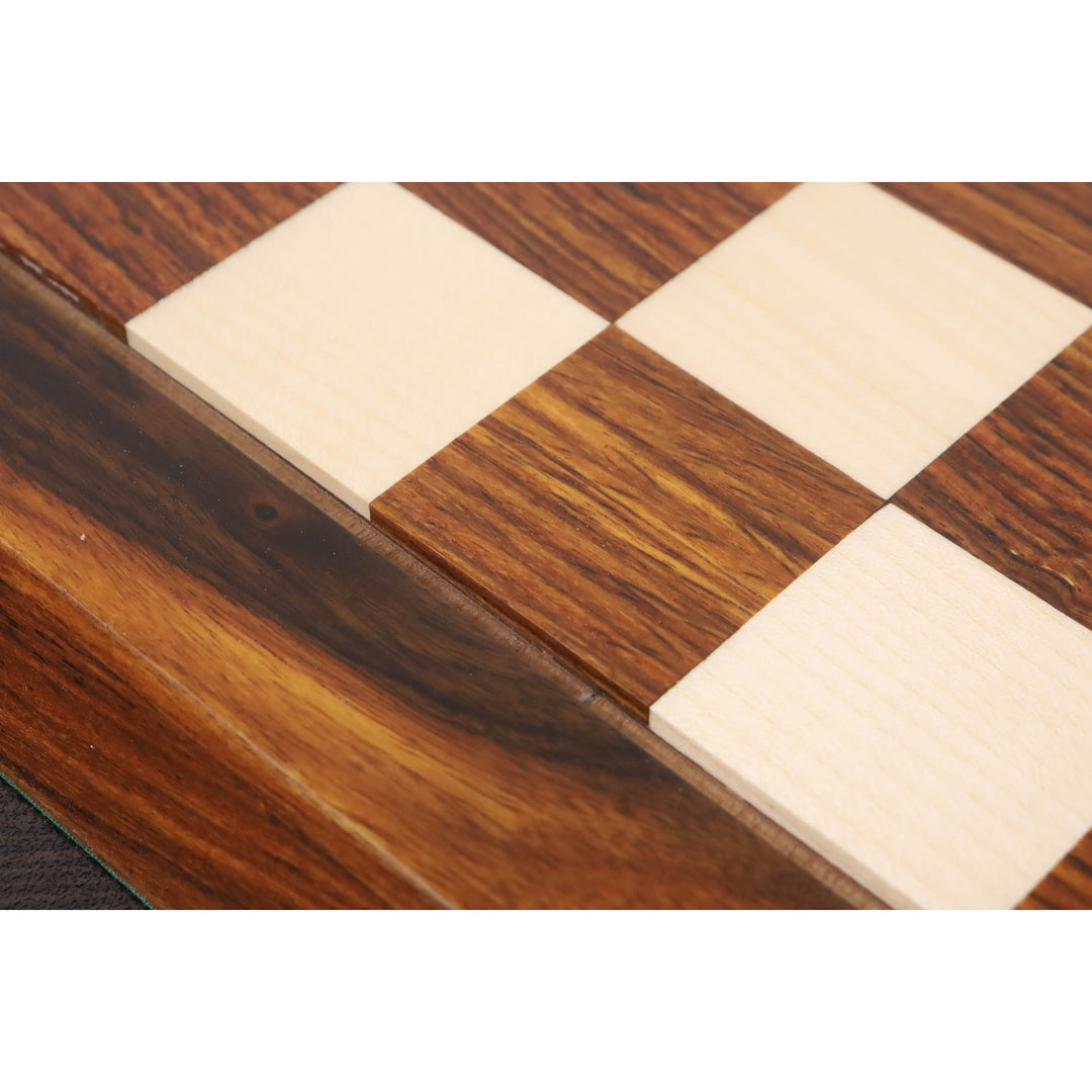 Macro view of 38mm golden rosewood and maple squares on a Drueke style wooden chess board.