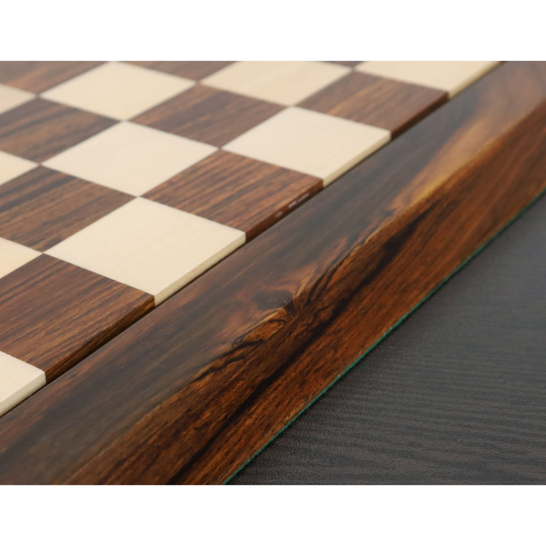 Detailed side view of the beveled golden rosewood edge on a Drueke style chess board.