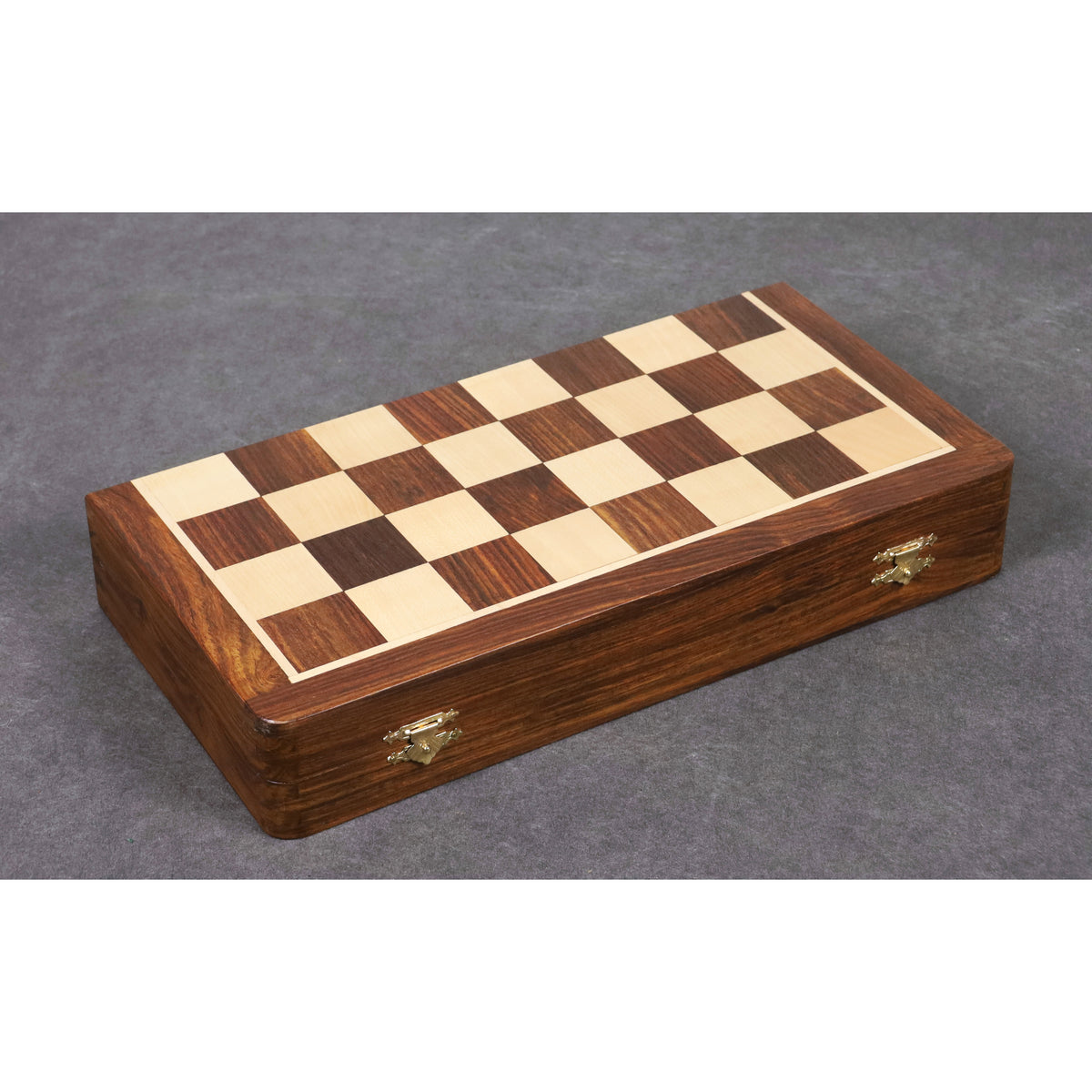Closed 14 inch golden rosewood folding chess board with secure metal brass latches.