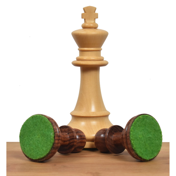 Boxwood King piece and Golden Rosewood pawns with green felt bases for scratch protection.