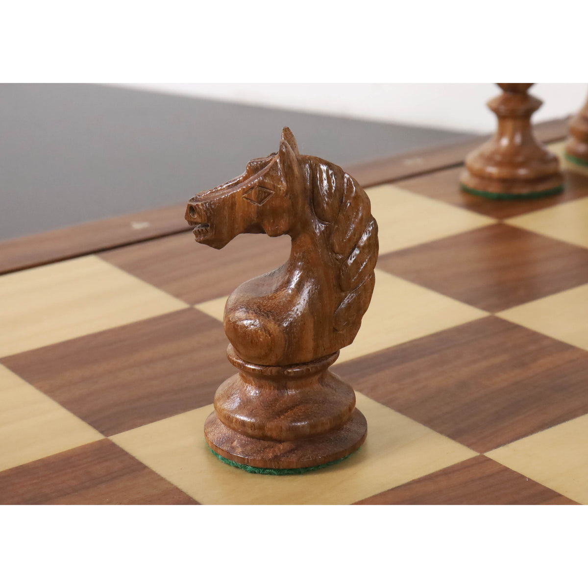 Intricate carving details of a golden rosewood knight from the Botvinnik Flohr-I Soviet set.