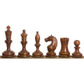 A complete lineup of the 1933 Botvinnik Flohr chess pieces carved from rich golden rosewood.