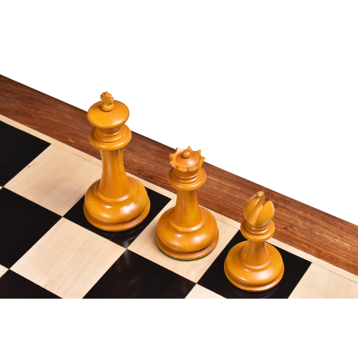 Overhead view of the antiqued boxwood King, Queen, and Bishop showing the 4.5 inch scale.