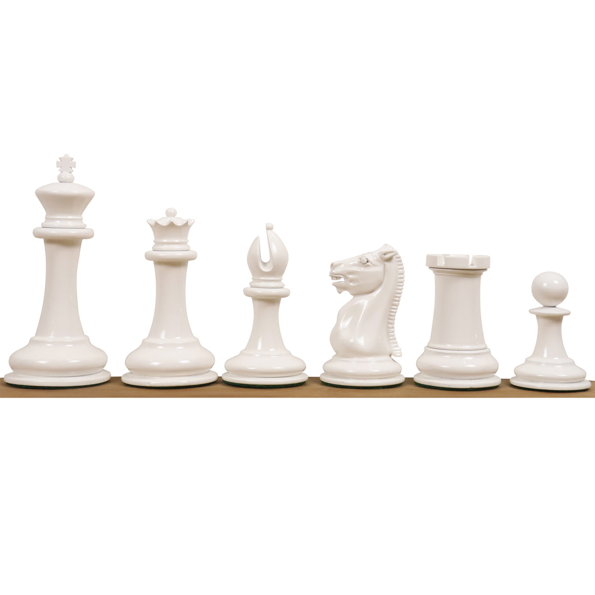 Glossy ivory lacquer Leuchars Cook Staunton chessmen from King to Pawn in a row.