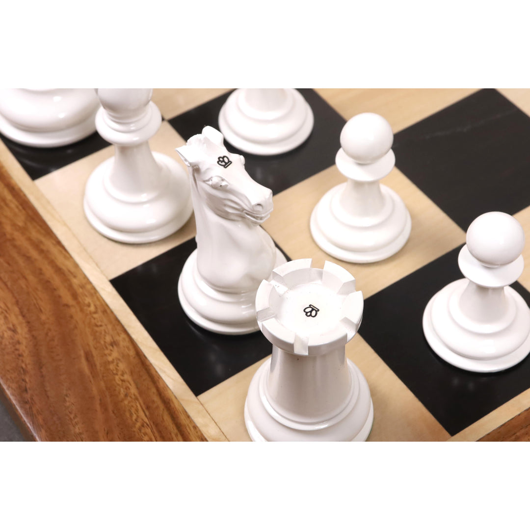 Overhead shot of ivory chess pieces showing traditional stamped markings on the Knight and Rook.