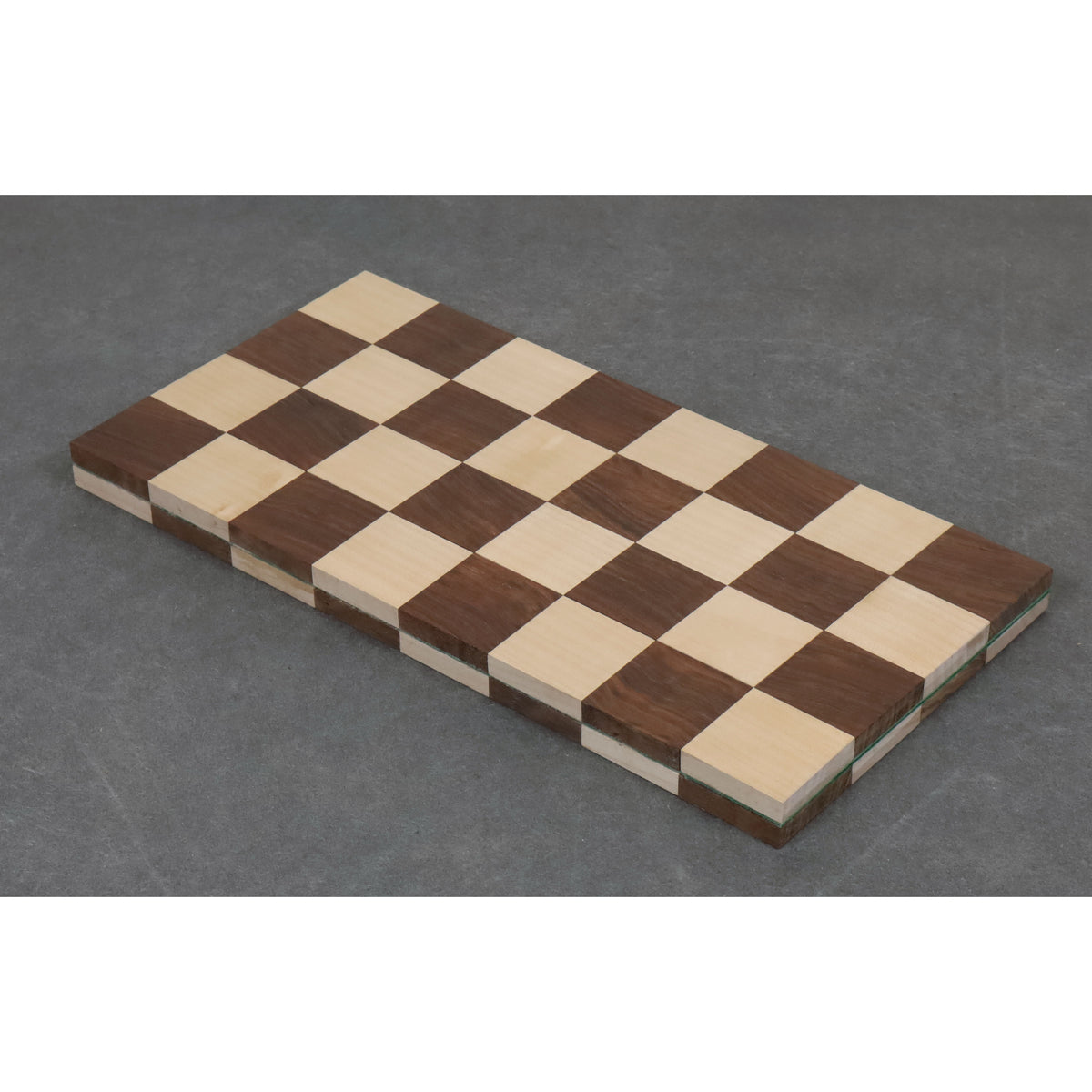 Portable solid wood travel chess board folded in half to show the golden rosewood and maple wood grain.