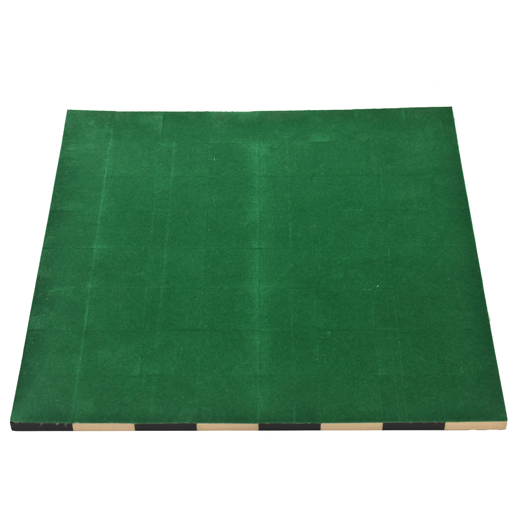 Bottom view of the roll up travel chess board showing the protective green felt backing for scratch-free play.