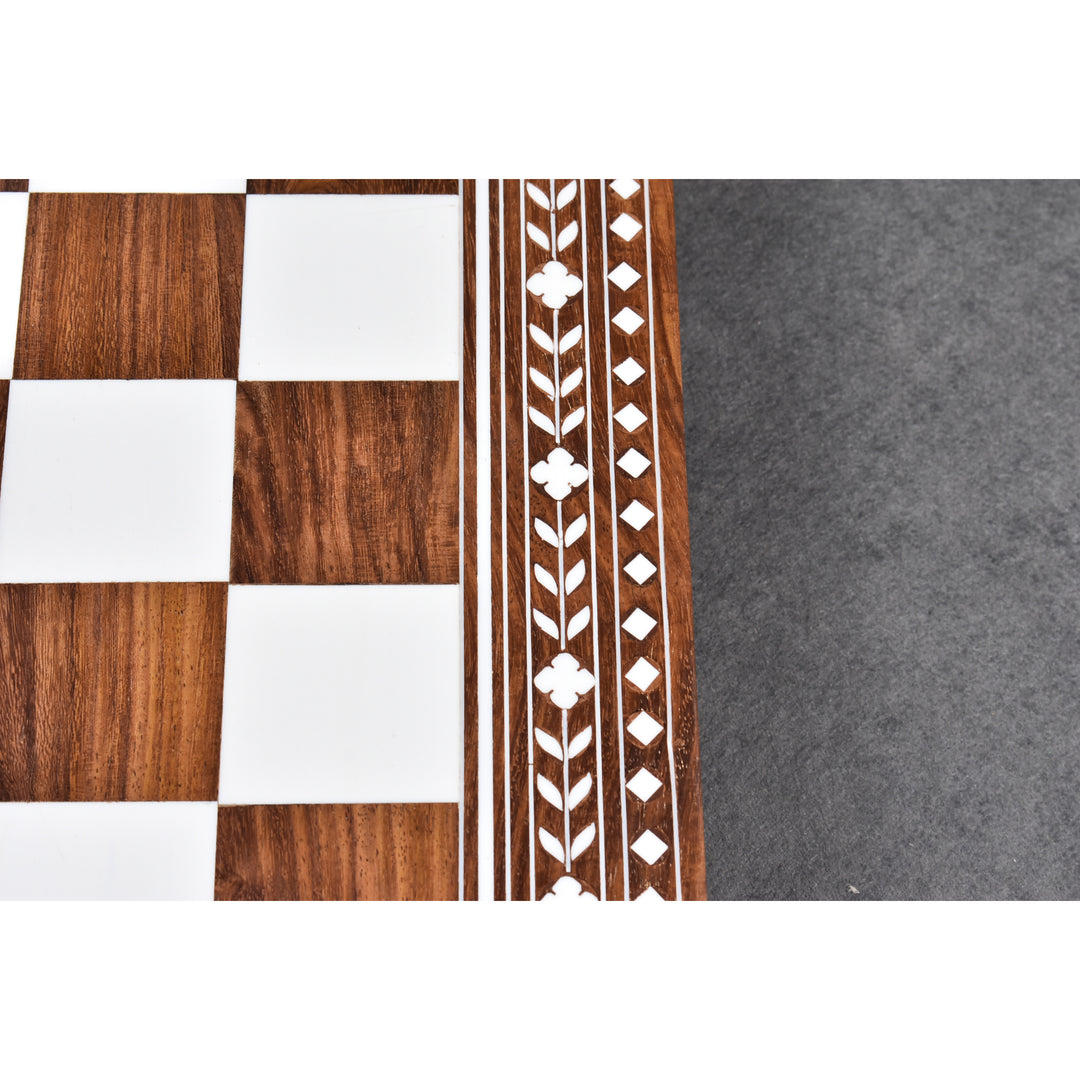 Macro shot of 45mm golden rosewood and white acrylic squares with ornate geometric floral borders.