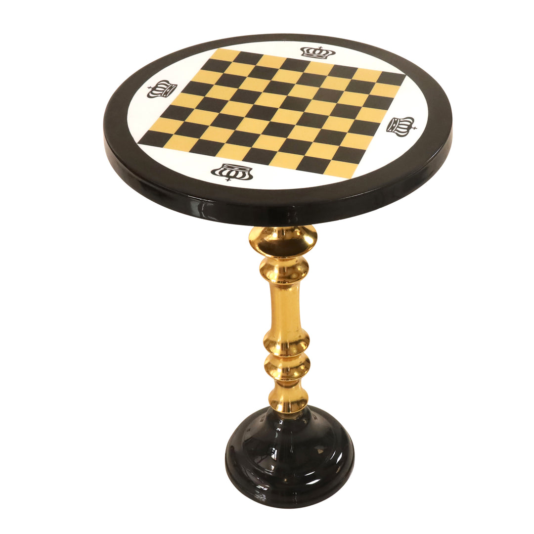 Circular brass chess table featuring a black and gold checkered board and decorative crown motifs.
