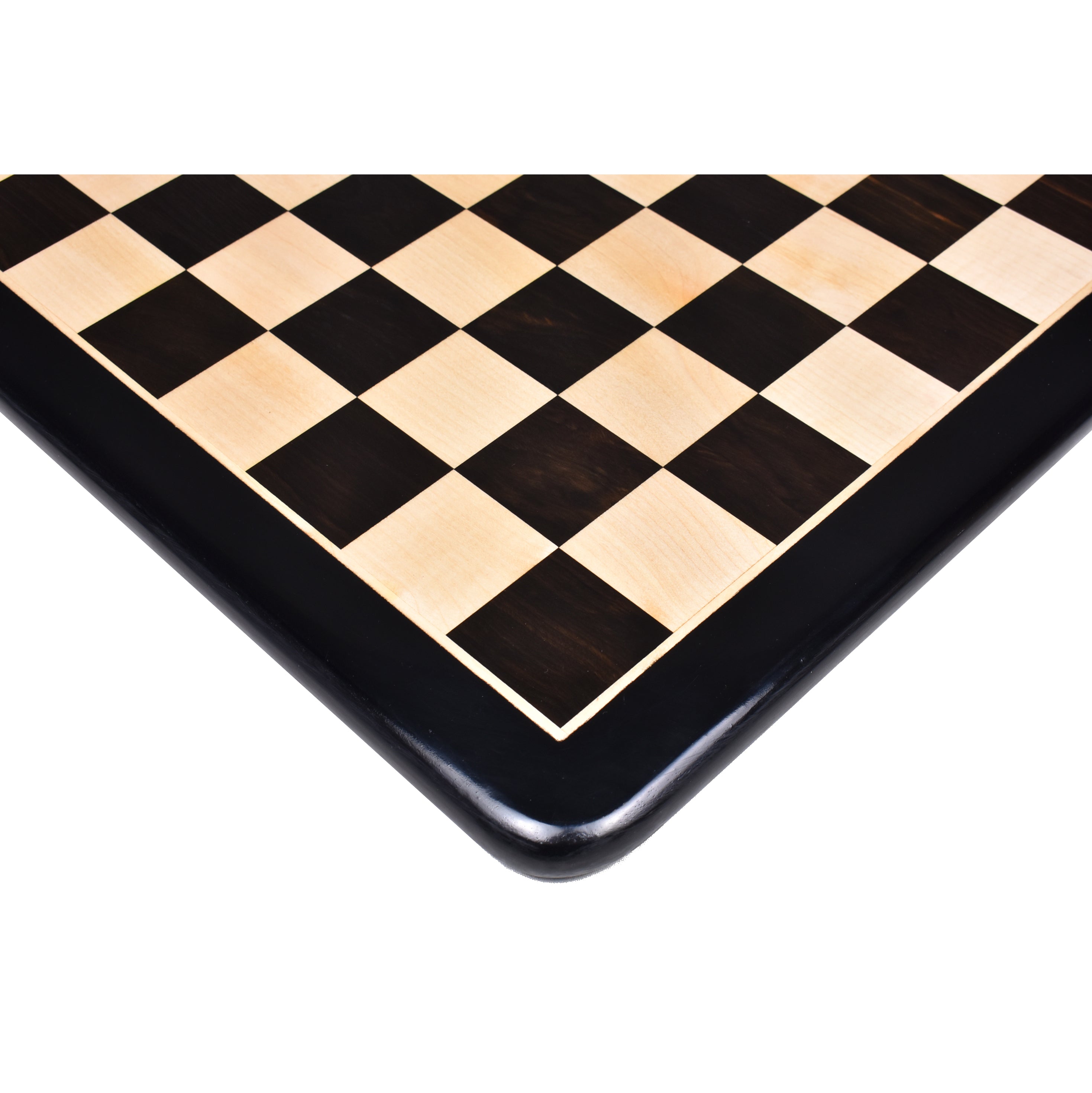 Close-up of a 19 inch ebony and maple chess board featuring a rounded corner and precise inlay.