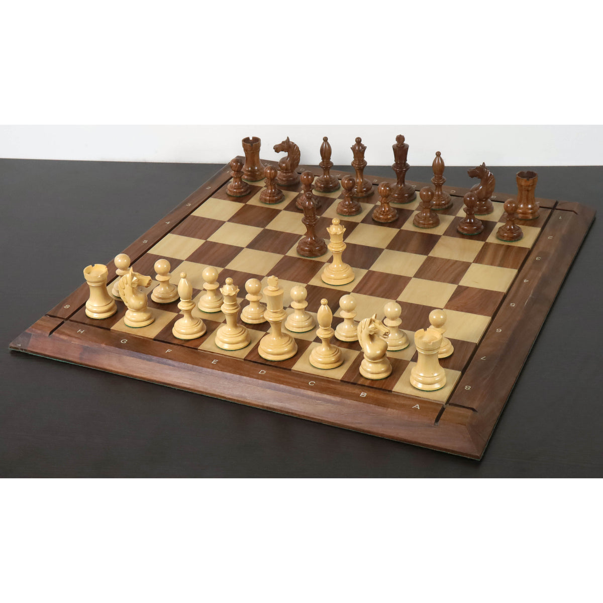 Full 3.6 inch 1933 Botvinnik Flohr Soviet chess set displayed on a coordinate wooden board.