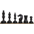 Ebonised boxwood 1933 Soviet chess pieces including king with unique finial and carved knight.