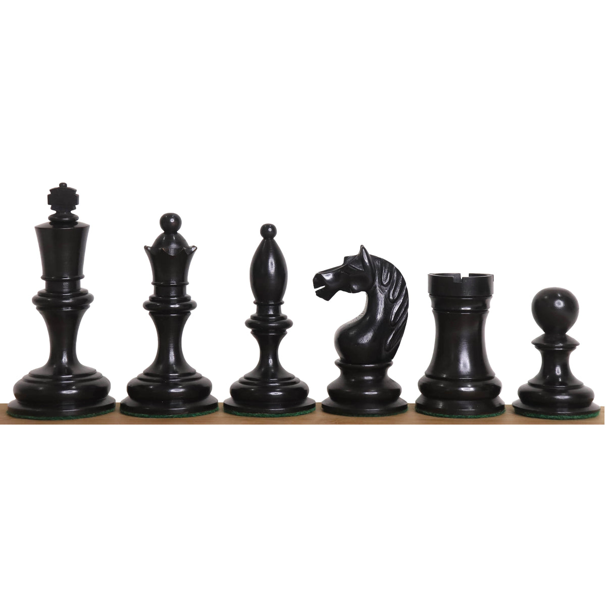 Ebonised boxwood 1933 Soviet chess pieces including king with unique finial and carved knight.