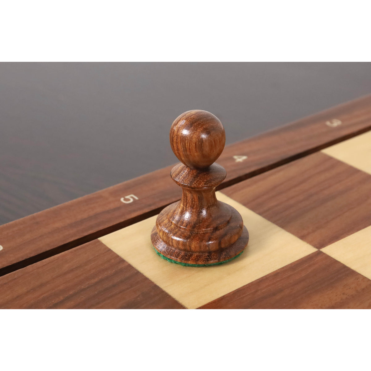 Golden Rosewood pawn from the Botvinnik Flohr Soviet series, highlighting natural wood grain.
