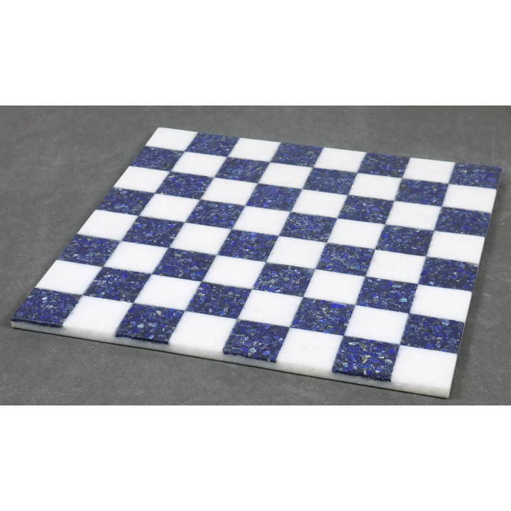 Handcrafted square borderless chess board made from blue lapis lazuli and white stone.