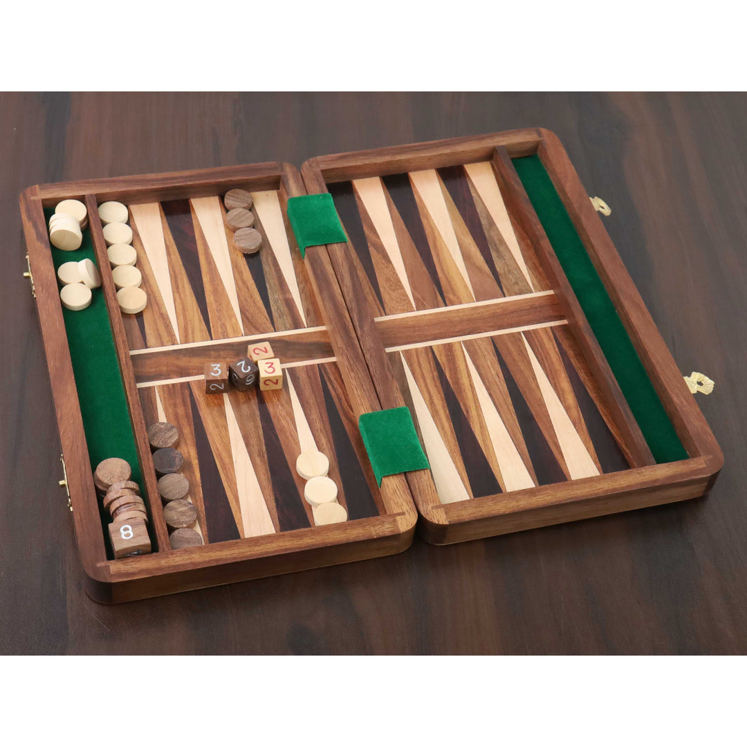 Portable wood backgammon game set with checkers and dice on a dark wooden tabletop.